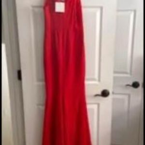 Beautiful red long evening gown. Perfect for prom or formal wedding. Never worn